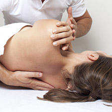 Image of a woman getting an adjustment