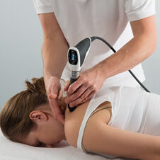 Image of a woman getting Shockwave Therapy