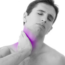 Image of a man holding his neck